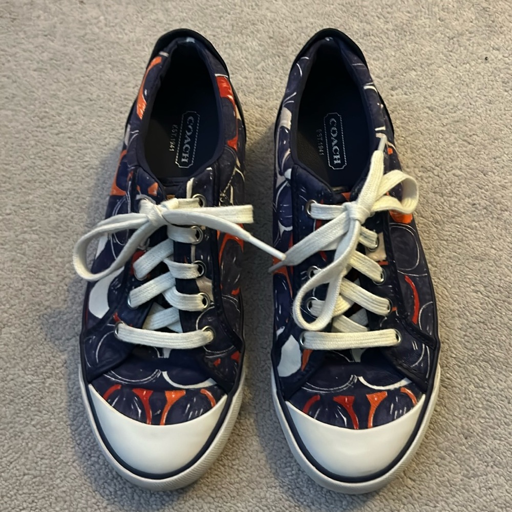 Coach navy sneakers.